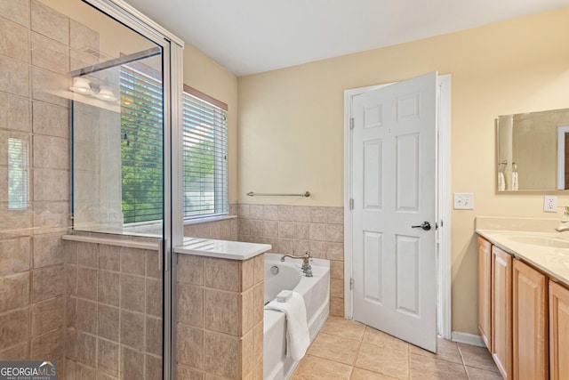 3845 New Salem Ct, Cumming, GA 30040 - full bathroom featuring vanity, a bath, a stall shower, and tile patterned flooring