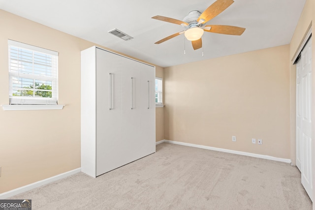 3845 New Salem Ct, Cumming, GA 30040 - unfurnished bedroom featuring a closet, carpet floors, and ceiling fan