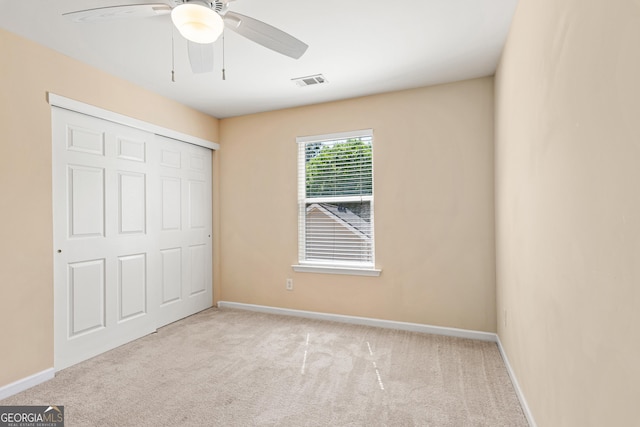 3845 New Salem Ct, Cumming, GA 30040 - unfurnished bedroom featuring carpet flooring, ceiling fan, and a closet