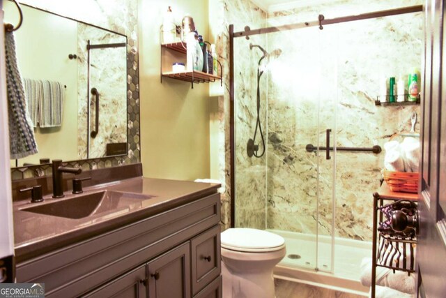 5301 Walden Park Dr Unit 5301, Savannah, GA 31410 - bathroom with vanity, a shower stall, and wood finished floors