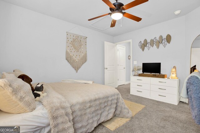 bedroom featuring arched walkways, a ceiling fan, and carpet