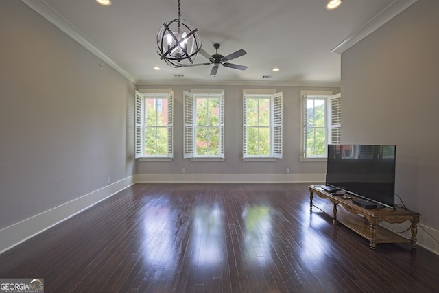 4143 N Swann St, Covington, GA 30014 - living area featuring baseboards, crown molding, ceiling fan with notable chandelier, and a healthy amount of sunlight