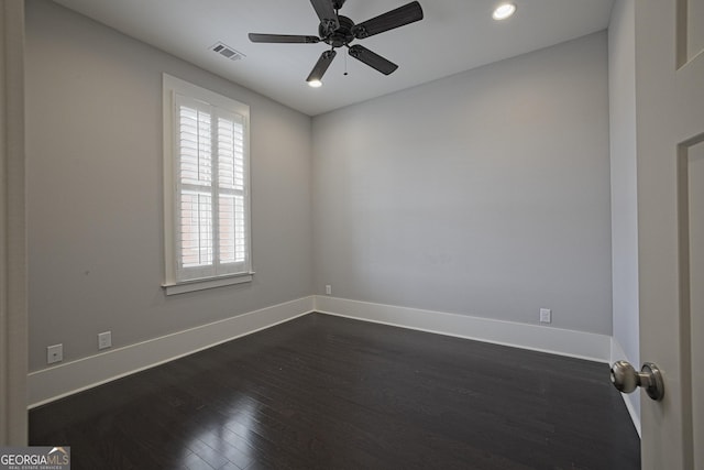 4143 N Swann St, Covington, GA 30014 - empty room with baseboards, dark wood-type flooring, recessed lighting, and visible vents