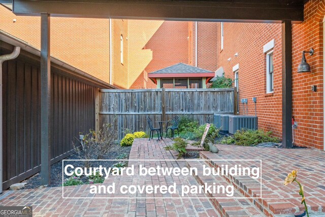 4143 N Swann St, Covington, GA 30014 - view of patio / terrace with fence and cooling unit