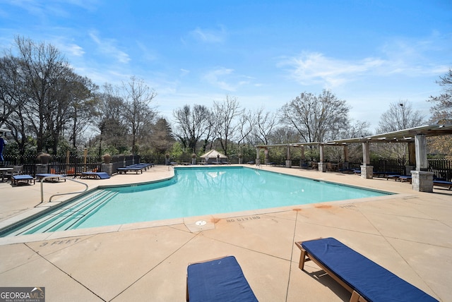 4143 N Swann St, Covington, GA 30014 - pool with a patio and fence