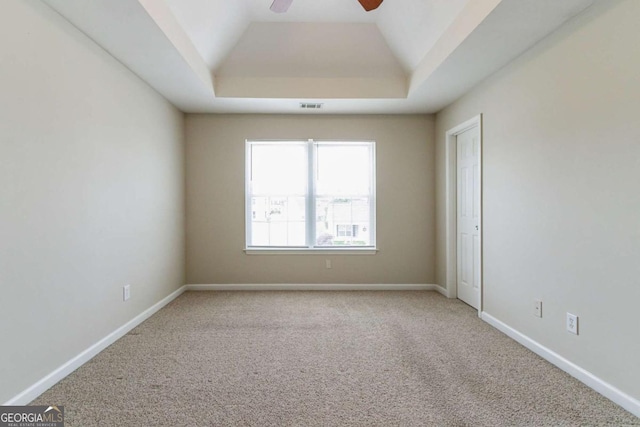 4870 Heather Mill Trce, Snellville, GA 30039 - carpeted empty room featuring a ceiling fan, a raised ceiling, baseboards, and visible vents