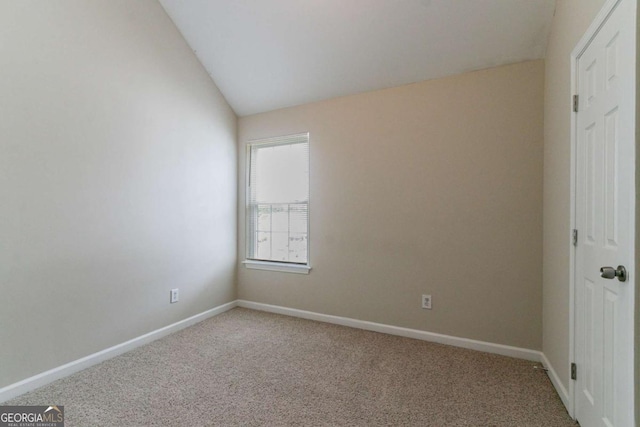 4870 Heather Mill Trce, Snellville, GA 30039 - carpeted empty room with baseboards and lofted ceiling