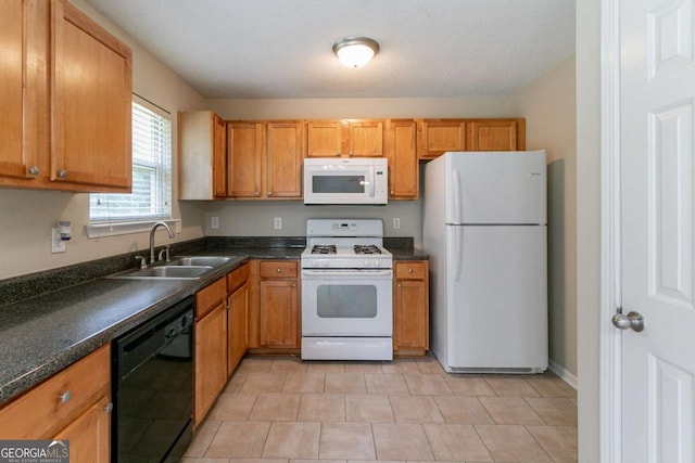 4870 Heather Mill Trce, Snellville, GA 30039 - kitchen with a sink, brown cabinetry, white appliances, light tile patterned floors, and dark countertops