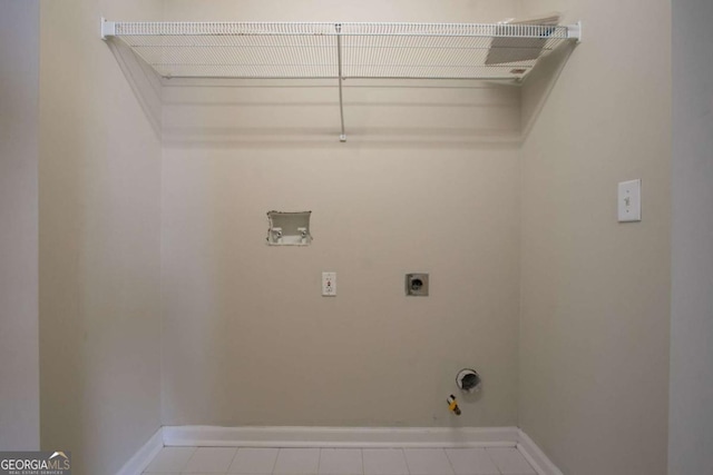 4870 Heather Mill Trce, Snellville, GA 30039 - laundry room featuring laundry area, hookup for an electric dryer, baseboards, and washer hookup