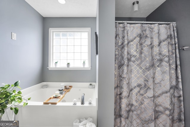 full bathroom featuring a bath and a shower with shower curtain