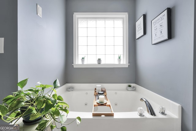 bathroom with a jetted tub