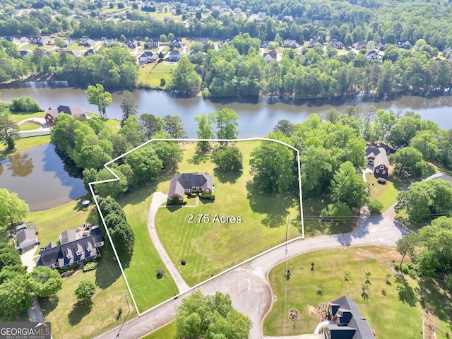 aerial view featuring a water view and a residential view