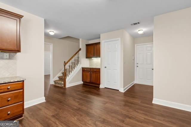 2055 Hickory Station Cir, Snellville, GA 30078 - interior space with baseboards, dark wood-style flooring, visible vents, and stairway