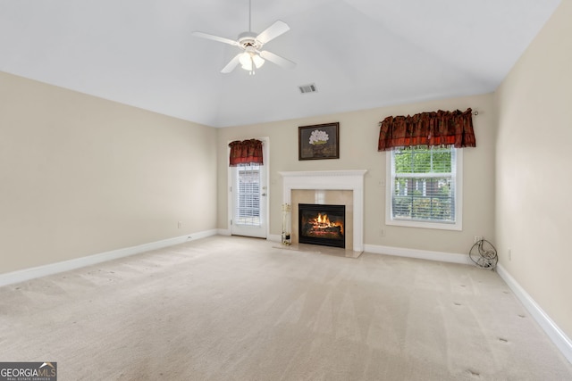 2055 Hickory Station Cir, Snellville, GA 30078 - unfurnished living room with visible vents, ceiling fan, high vaulted ceiling, a high end fireplace, and carpet