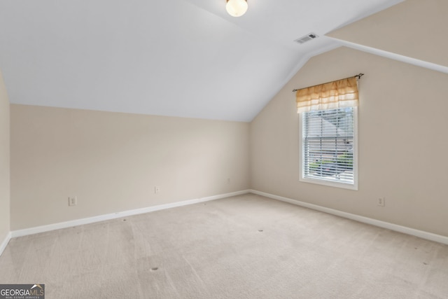 2055 Hickory Station Cir, Snellville, GA 30078 - bonus room with carpet floors, baseboards, visible vents, and lofted ceiling