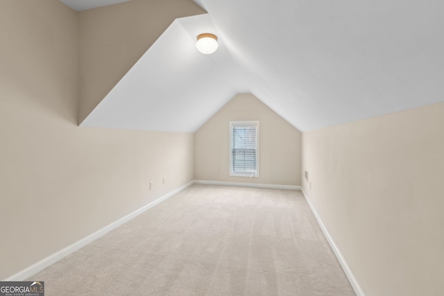 2055 Hickory Station Cir, Snellville, GA 30078 - bonus room featuring baseboards, carpet, and vaulted ceiling