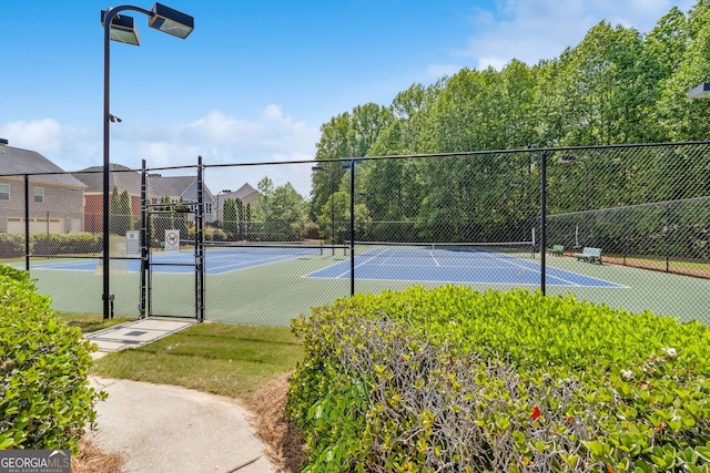 2055 Hickory Station Cir, Snellville, GA 30078 - view of tennis court with fence and a gate