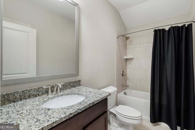 3024 Malbec Vly, Acworth, GA 30101 - full bath featuring toilet, lofted ceiling, vanity, shower / bath combo, and tile patterned floors