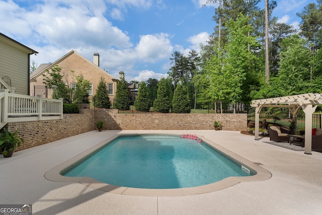 view of pool featuring a patio area, a pergola, a fenced backyard, and an outdoor hangout area