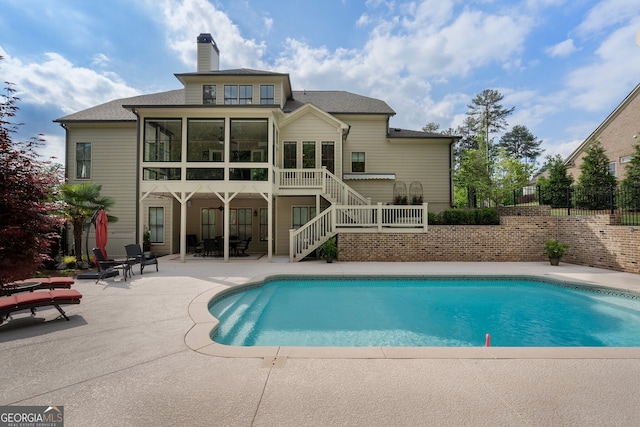3024 Malbec Vly, Acworth, GA 30101 - rear view of house with a patio, stairway, a chimney, a sunroom, and fence