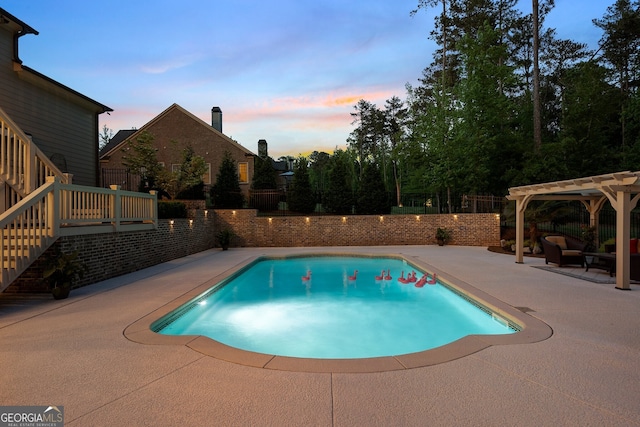 pool at dusk featuring a patio, a pergola, a fenced backyard, an outdoor hangout area, and stairs