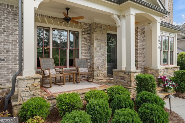 view of patio featuring covered porch and ceiling fan