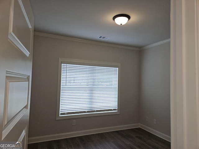457 Banff Dr, Winder, GA 30680 - empty room with dark wood-type flooring, crown molding, and baseboards
