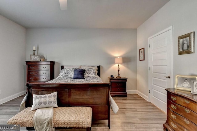 5299 Noble Village Way, Lilburn, GA 30047 - bedroom featuring baseboards, ceiling fan, and wood finished floors