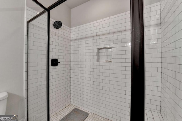 5299 Noble Village Way, Lilburn, GA 30047 - bathroom with toilet and a shower stall
