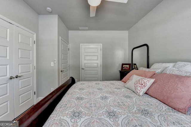 5299 Noble Village Way, Lilburn, GA 30047 - bedroom with a ceiling fan, visible vents, and a closet