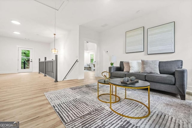 921 Cone Rd, Forest Park, GA 30297 - living area featuring attic access, light wood-style floors, and recessed lighting