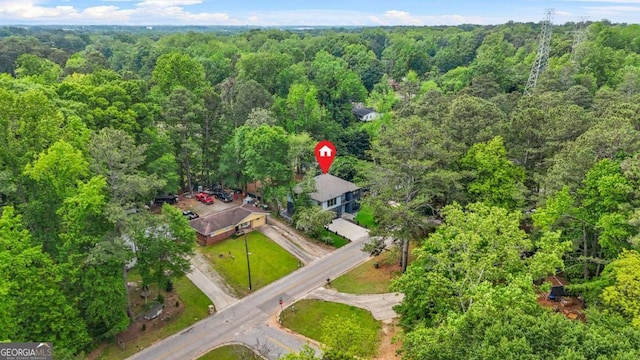 drone / aerial view with a view of trees