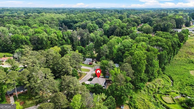 921 Cone Rd, Forest Park, GA 30297 - aerial view of property and surrounding area with a heavily wooded area