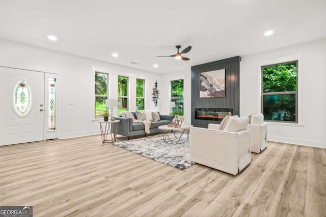 921 Cone Rd, Forest Park, GA 30297 - living room with ceiling fan, plenty of natural light, recessed lighting, light wood-type flooring, and a large fireplace