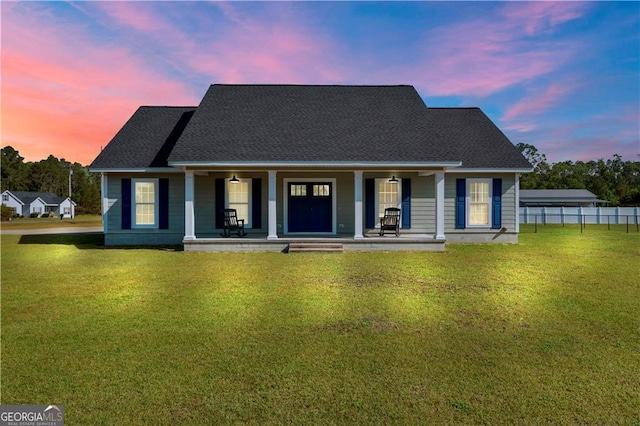 3224 Ware St, Blackshear, GA 31516 - view of front of home featuring a lawn, fence, and a porch