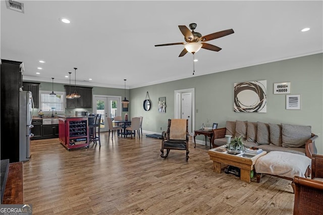 3224 Ware St, Blackshear, GA 31516 - living area featuring ceiling fan, light wood-type flooring, recessed lighting, and visible vents