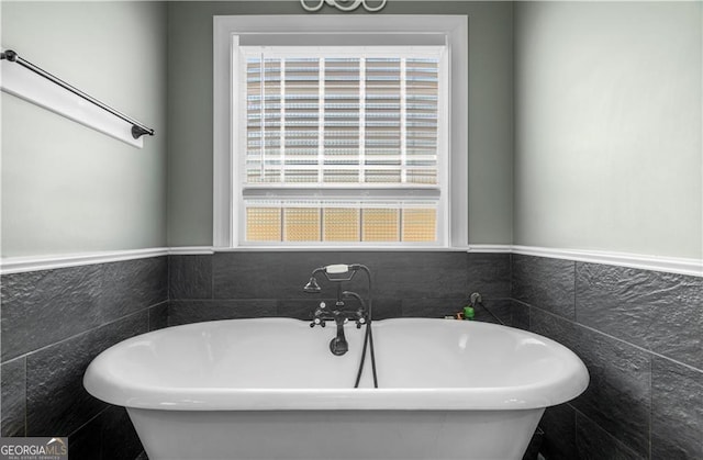 3224 Ware St, Blackshear, GA 31516 - full bathroom featuring a freestanding tub, tile walls, and wainscoting