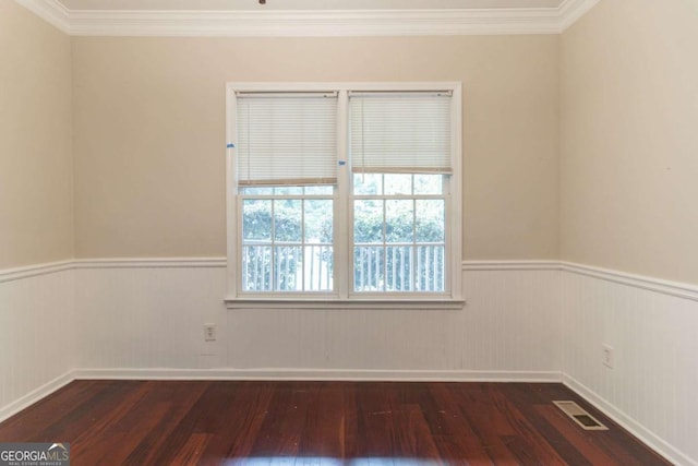 6416 Vicksburg Ct NW, Acworth, GA 30101 - unfurnished room with dark wood-style floors, wainscoting, and ornamental molding