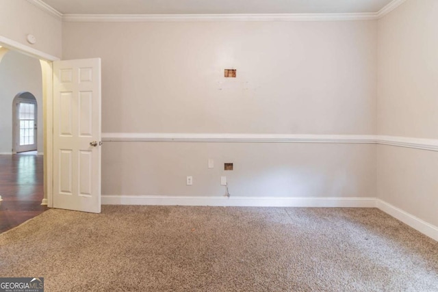 6416 Vicksburg Ct NW, Acworth, GA 30101 - empty room featuring carpet floors, ornamental molding, arched walkways, and baseboards