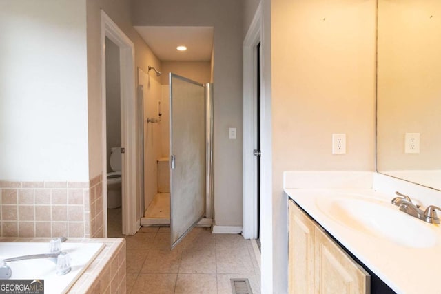 6416 Vicksburg Ct NW, Acworth, GA 30101 - full bathroom featuring tile patterned flooring, a stall shower, toilet, vanity, and a bath
