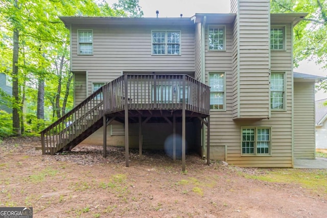 6416 Vicksburg Ct NW, Acworth, GA 30101 - rear view of property with stairway, a wooden deck, a chimney, and oil tank