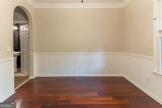 6416 Vicksburg Ct NW, Acworth, GA 30101 - unfurnished room with hardwood / wood-style flooring, a wainscoted wall, arched walkways, and ornamental molding