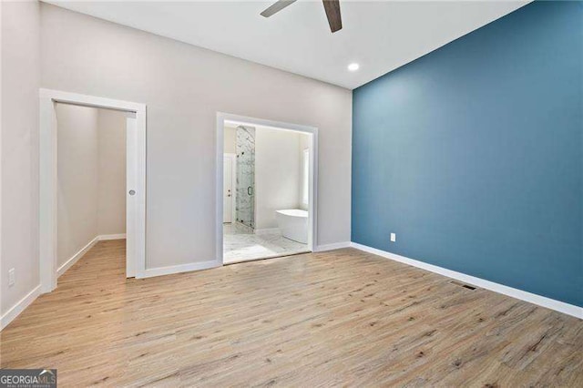 962 Welch St SW, Atlanta, GA 30310 - unfurnished bedroom featuring recessed lighting, baseboards, wood finished floors, and ensuite bath