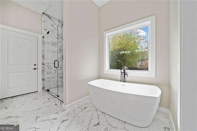 962 Welch St SW, Atlanta, GA 30310 - full bathroom featuring baseboards, marble finish floor, and a marble finish shower
