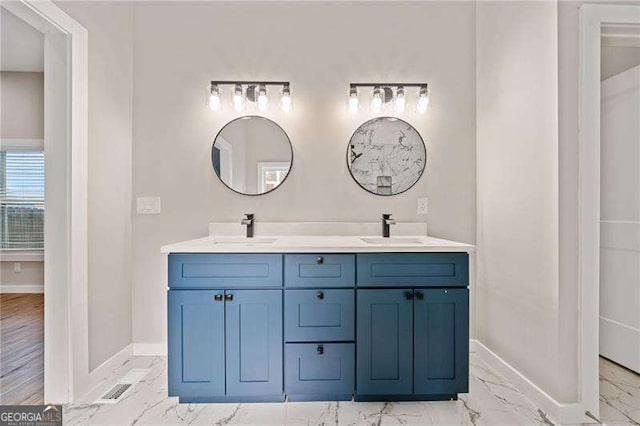 962 Welch St SW, Atlanta, GA 30310 - full bathroom with a sink, baseboards, and marble finish floor