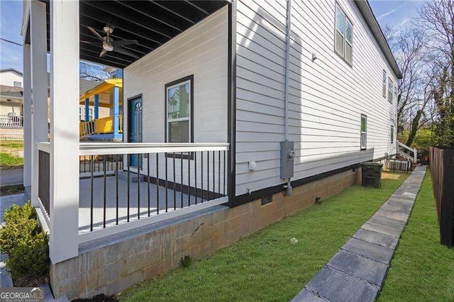 962 Welch St SW, Atlanta, GA 30310 - view of home's exterior featuring a ceiling fan, fence, a yard, and crawl space