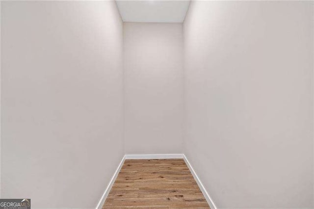 962 Welch St SW, Atlanta, GA 30310 - room details featuring baseboards and wood finished floors