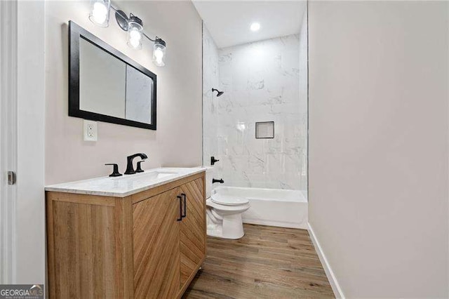 962 Welch St SW, Atlanta, GA 30310 - full bathroom with vanity, shower / bath combination, wood finished floors, and toilet
