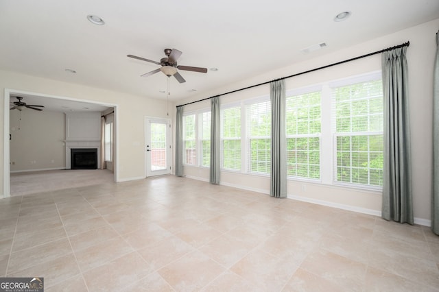 6732 Chimney Ridge Ct, Hoschton, GA 30548 - unfurnished living room featuring a ceiling fan, plenty of natural light, and recessed lighting