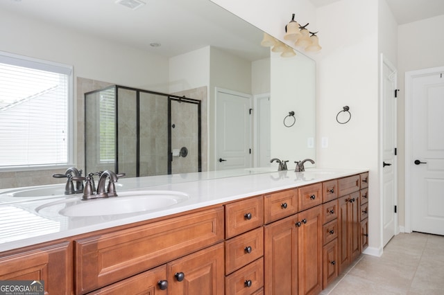 6732 Chimney Ridge Ct, Hoschton, GA 30548 - bathroom featuring double vanity, tile patterned flooring, and a stall shower